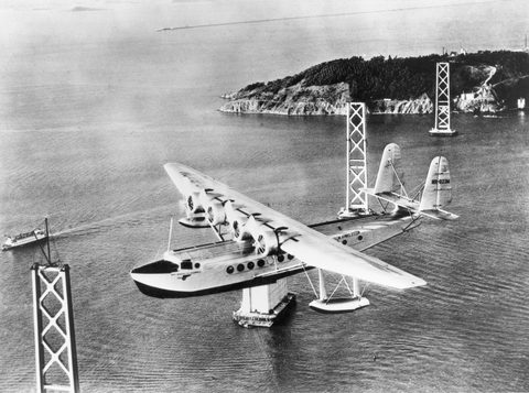 Pan American Clipper over the Bay Bridge by Pan American Airways — large framed print