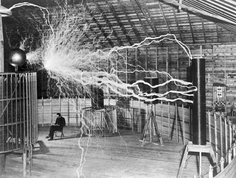 Nikola Tesla with His Equipment by Unknown photographer — large framed print