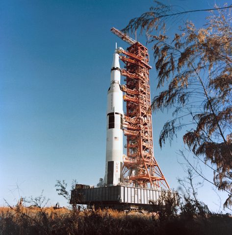 Apollo 16 Saturn V on the crawler under blue sky by NASA — large framed print