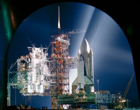 Columbia on the pad under night floodlights by NASA — large framed print