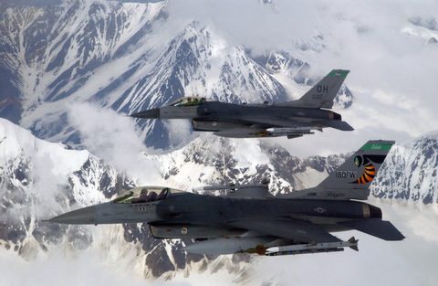 F-16s over Alaska by USAF / Rob Wieland — large framed print