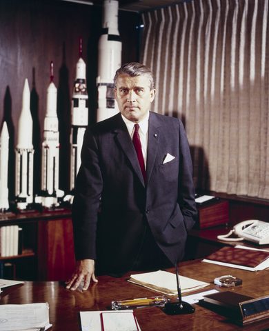 Wernher von Braun in His Office with Rocket Models by NASA / Marshall Space Flight Center — large framed print