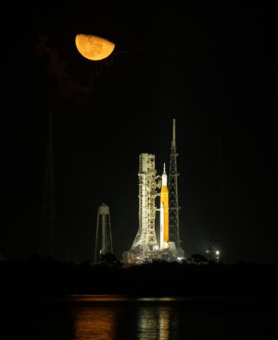 Artemis I SLS on Pad 39B under a crescent moon by NASA / NASA/Bill Ingalls — large framed print