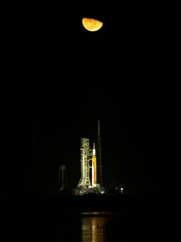 Artemis I SLS night pad reflected in the water by NASA / NASA/Bill Ingalls — large framed print