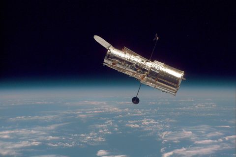 Hubble against the Earth horizon by NASA — large framed print
