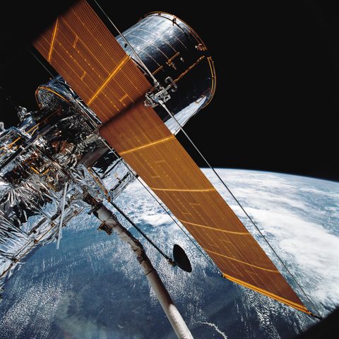 Hubble Space Telescope over Earth with arrays deployed by NASA — large framed print