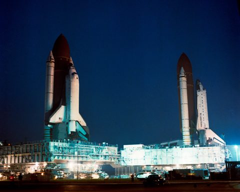 Columbia rolls past Atlantis at the VAB by NASA — large framed print