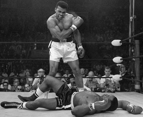Muhammad Ali Standing over Sonny Liston by John Rooney (Associated Press) — large framed print