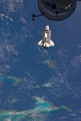 Atlantis over the Bahamas on approach to the ISS by NASA / Expedition 28 crew — large framed print