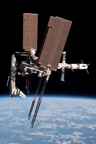 Endeavour docked over Earth by NASA / Paolo Nespoli — large framed print