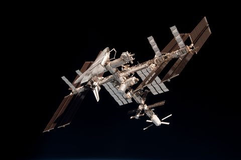 Endeavour and the ISS from Soyuz by NASA / Paolo Nespoli — large framed print