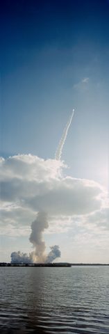 Discovery STS-31 punches through the clouds by NASA — large framed print