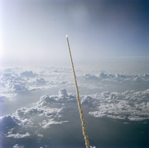 STS-7 Challenger ascent plume from chase plane by NASA — large framed print