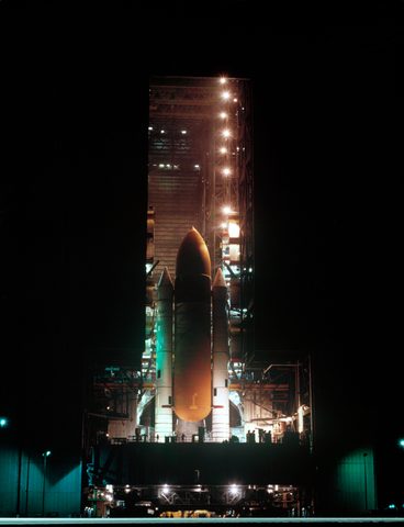 Challenger STS-8 stack inside the VAB at night by NASA — large framed print