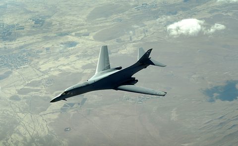 B-1B over Afghanistan by USAF / Aaron Allmon — large framed print