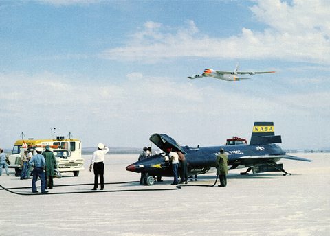 X-15 on the lakebed as the B-52 flies over by NASA — large framed print
